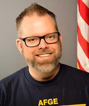 Matthew Uchaker smiling