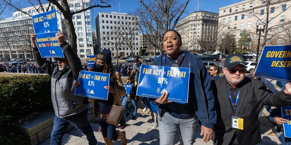 AFGE members marching at rally