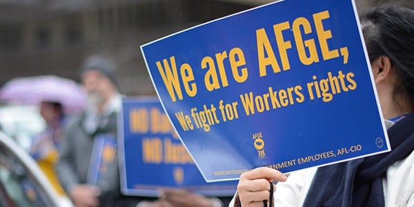 We fight for workers' rights sign