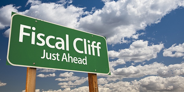 Sign that says fiscal cliff just ahead