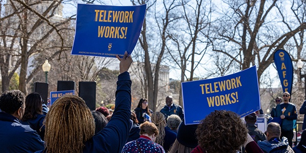 AFGE activists at rally with Telework Works signs
