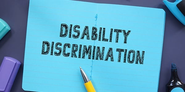 Notebook that says Disability Discrimination