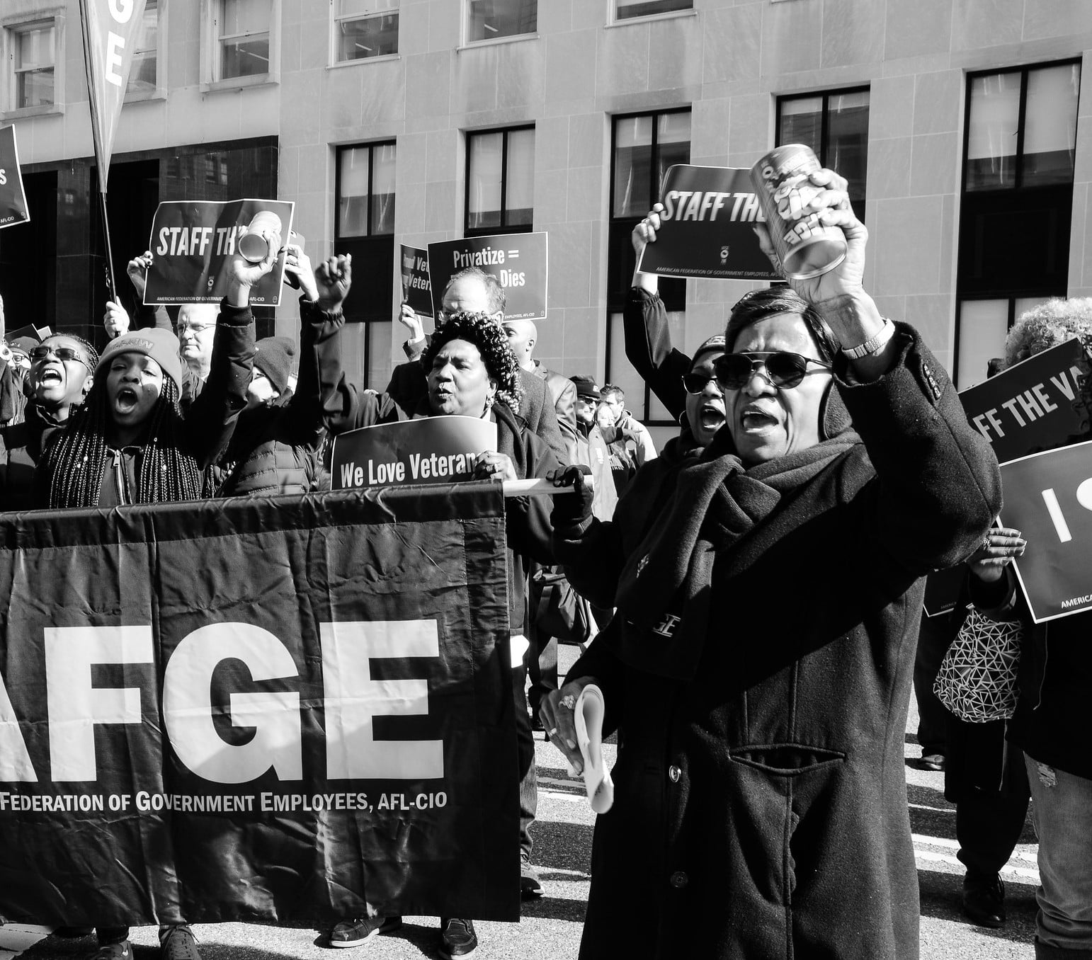 In 2018 Alma Lee leads AFGE members and other union activists in a demonstration outside the VA headquarters to raise awareness about staffing shortages and lack of funding for the agency.